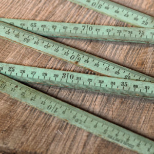 Double mètre pliant en bois et métal