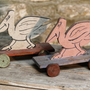 Paire de pélicans à roulettes - jeu de plancher à tirer