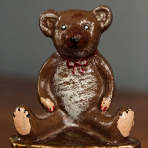 Cale porte "nounours" en fonte